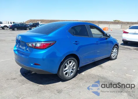 2018 Toyota Yaris Ia из США, поврежденный, VIN 3MYDLBYV7JY314998